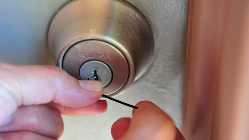 How to open a locked door with a bobby pin?